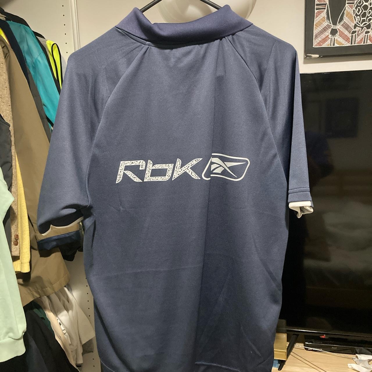 Reebok polo shirts deals silver