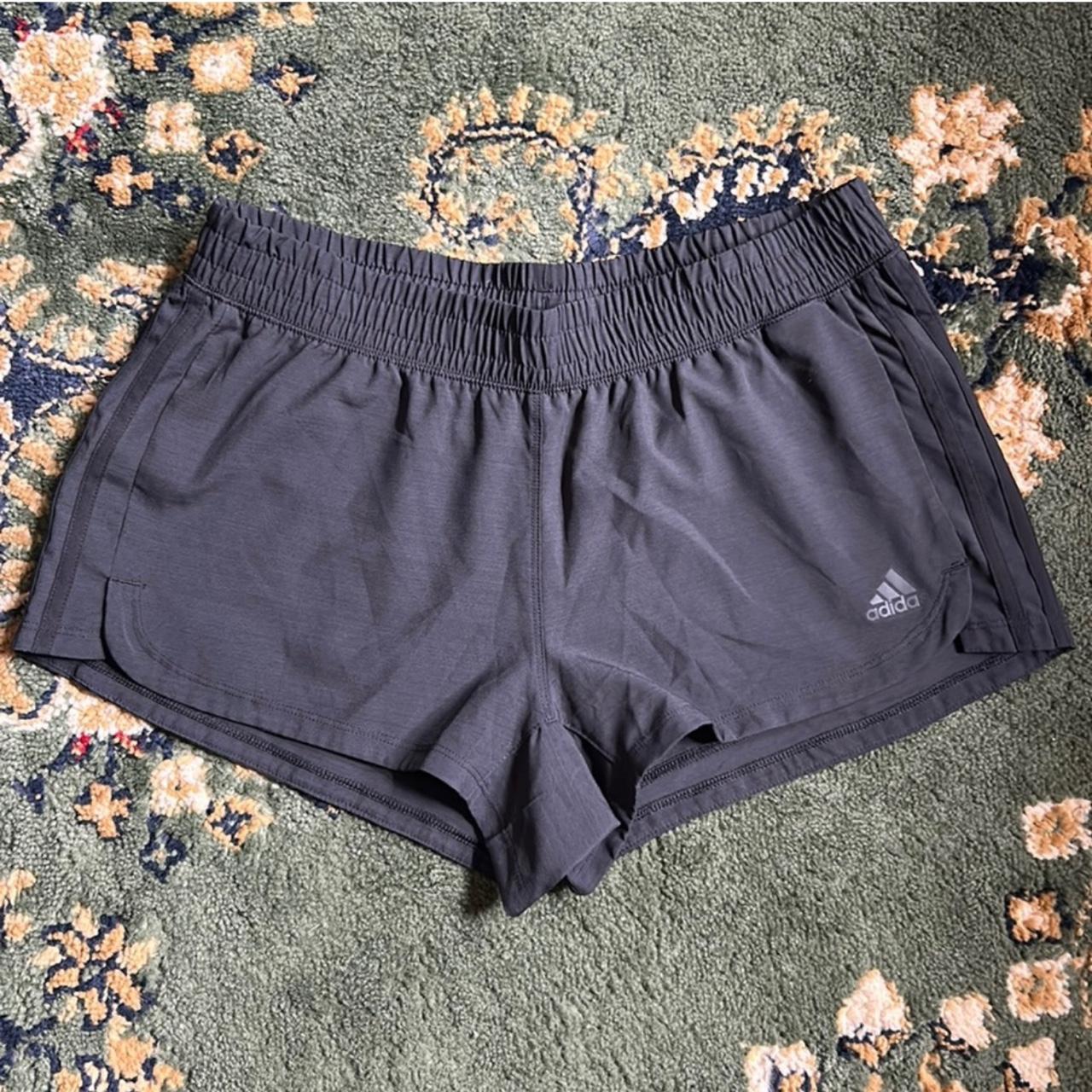 Adidas Black lightweight athletic shorts with an