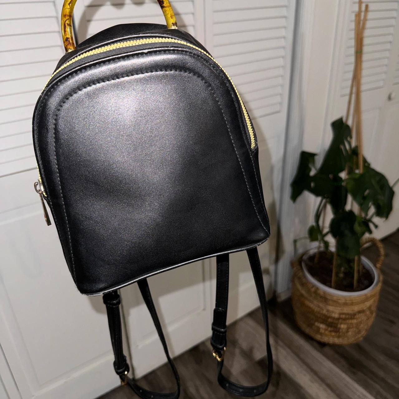 A New Day Mini Black Backpack In good condition Depop