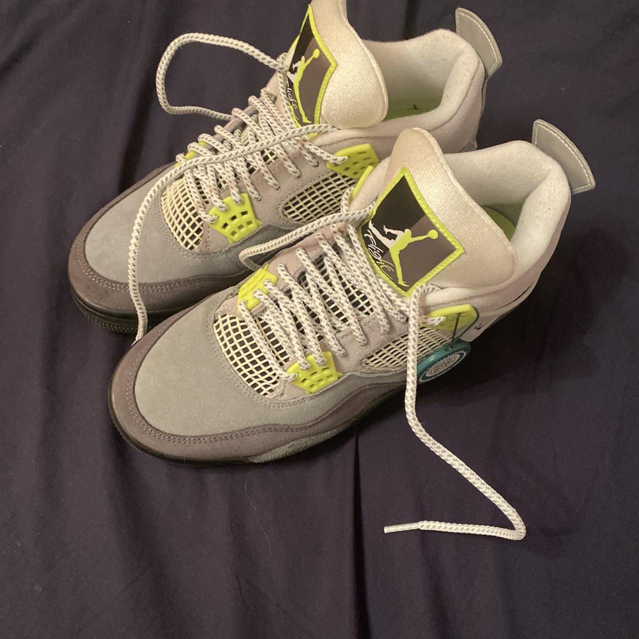 neon orange jordan 4