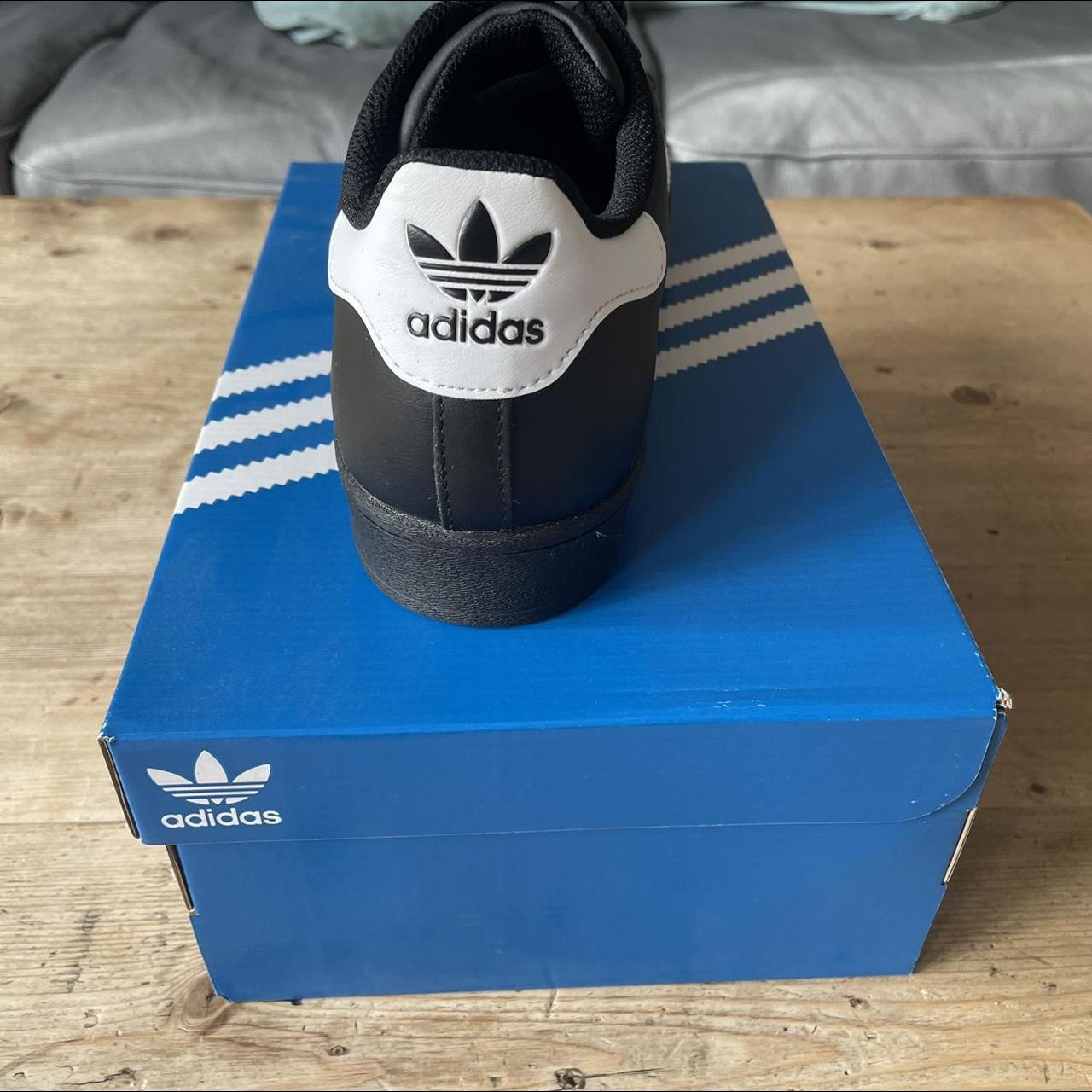 Adidas Originals Men's Black and White Trainers Depop