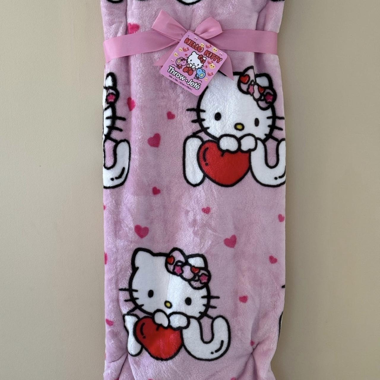 Hello Kitty black waterproof vinyl wraparound - Depop