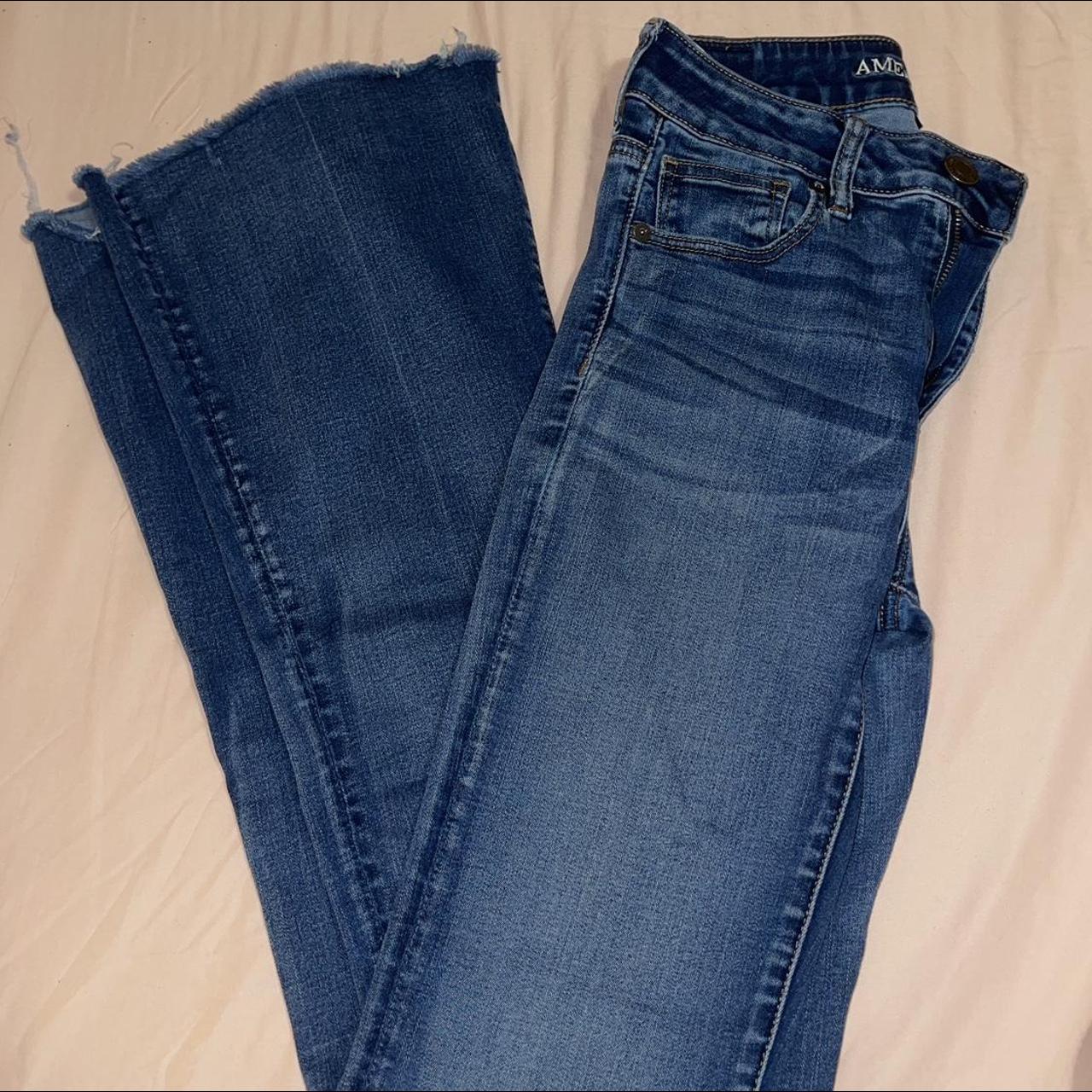 American Eagle Dark Wash Flared Raw Hem Jeans - says... - Depop