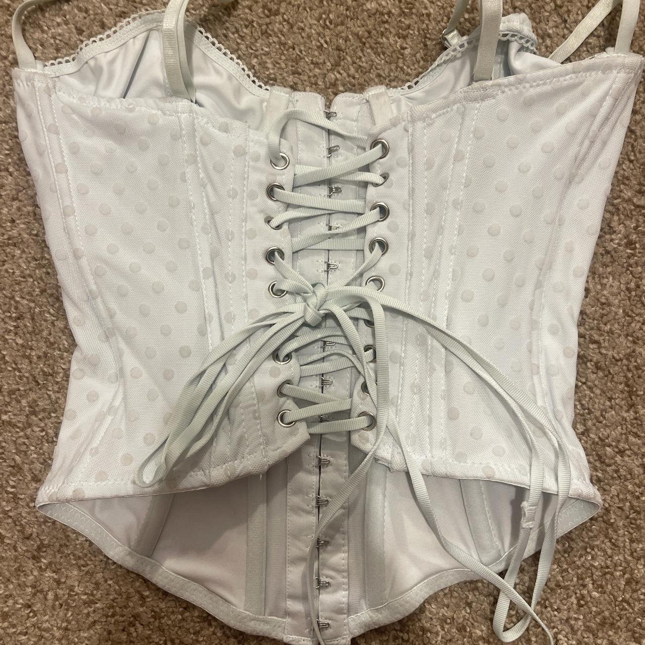 out from under light blue corset top Depop