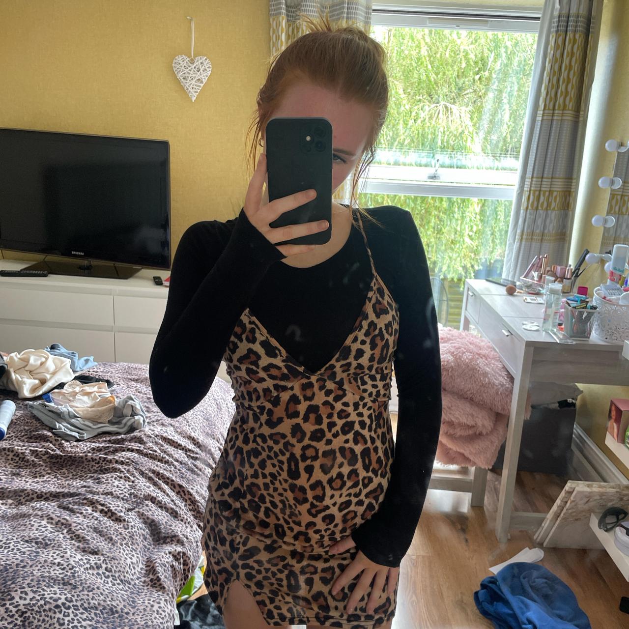 Leopard print dress with black top underneath online