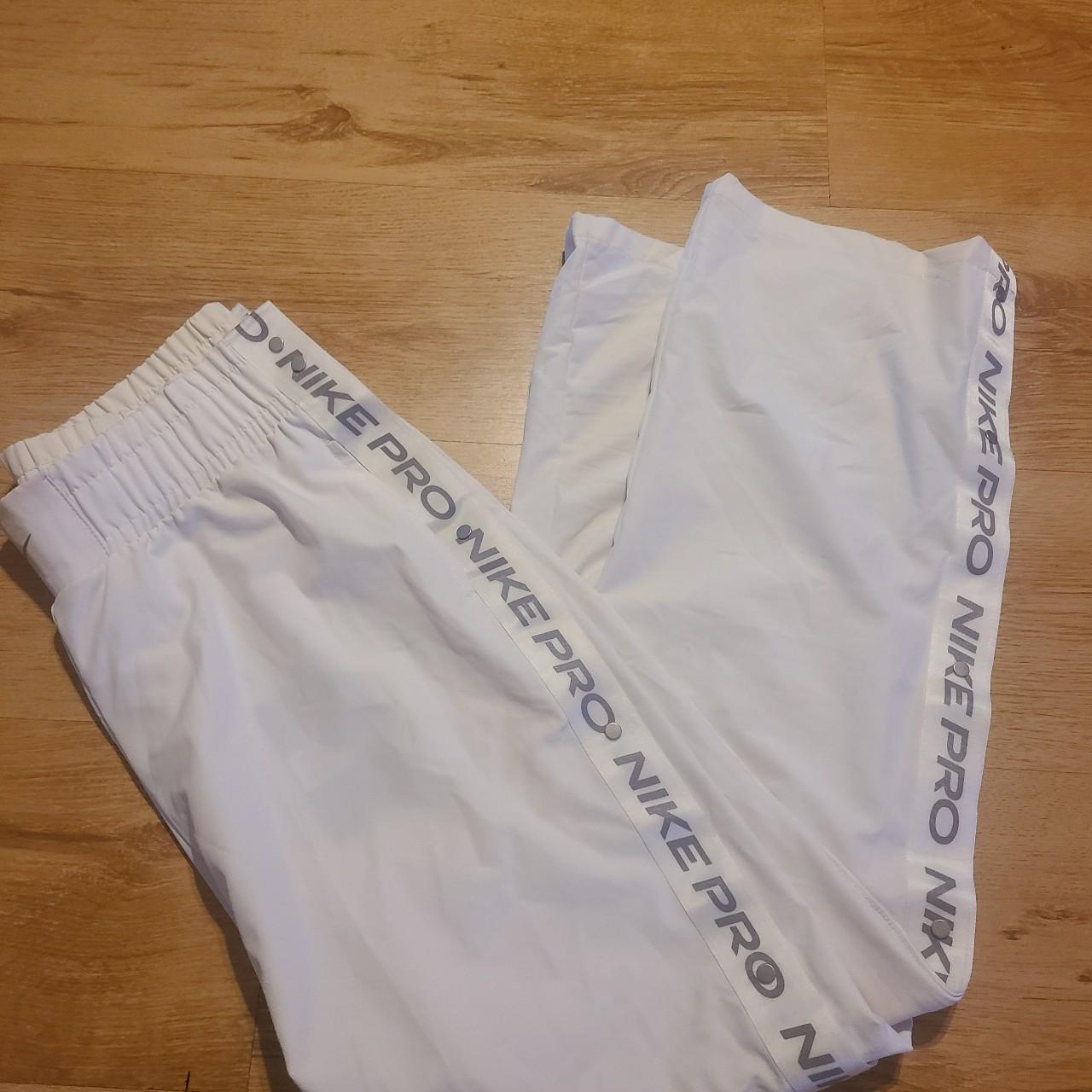 Womans new with tags nike pro tear away track pants Depop