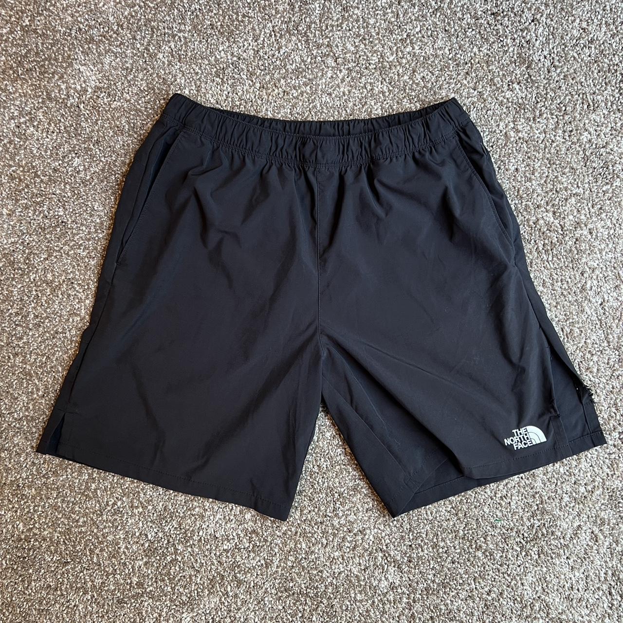 The North Face Shorts. They are torn at the short... - Depop