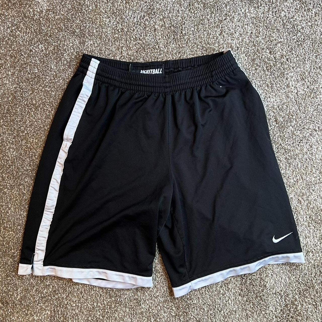 Black nike shorts top with white stripe