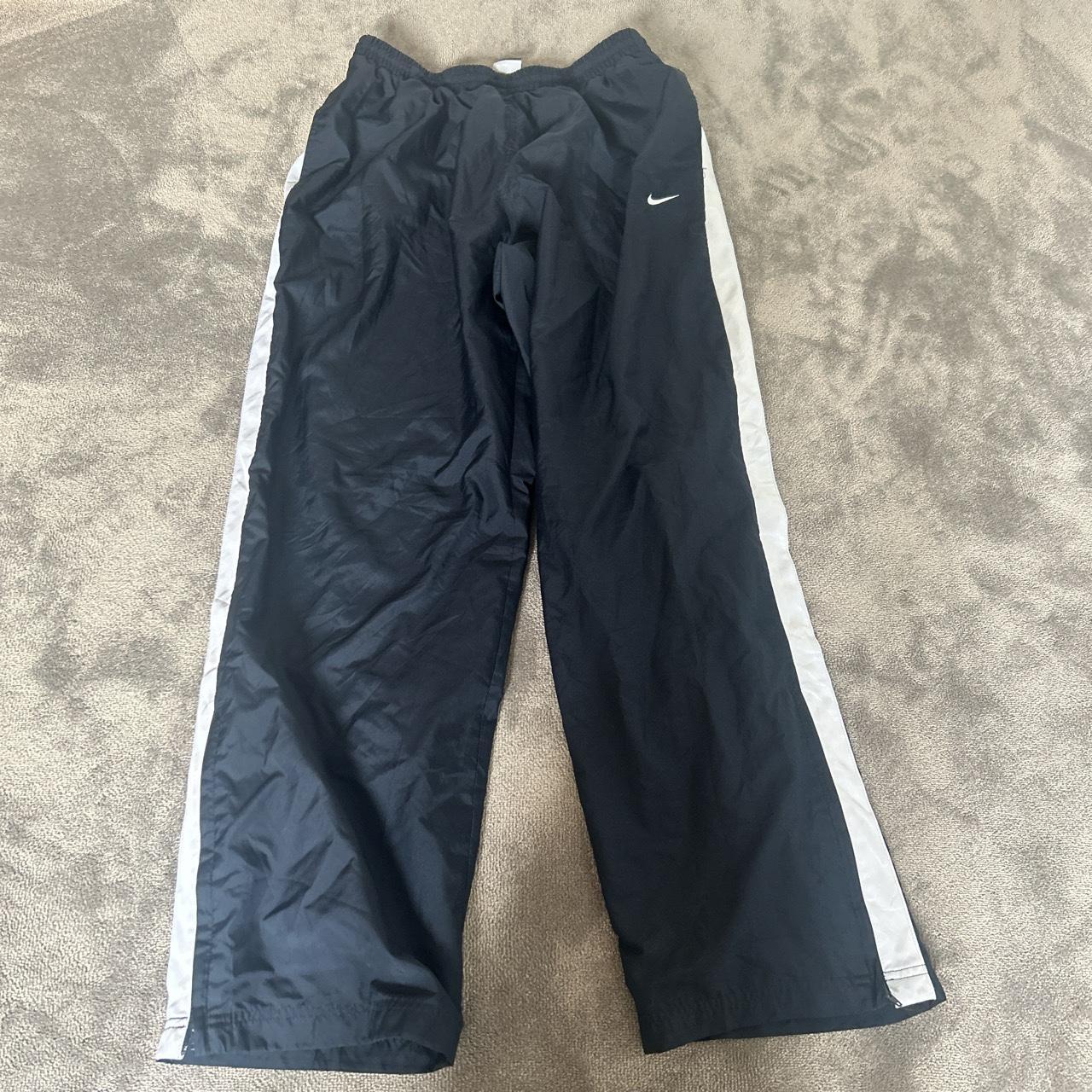 vintage nike trackies, good condition, XL but will... - Depop