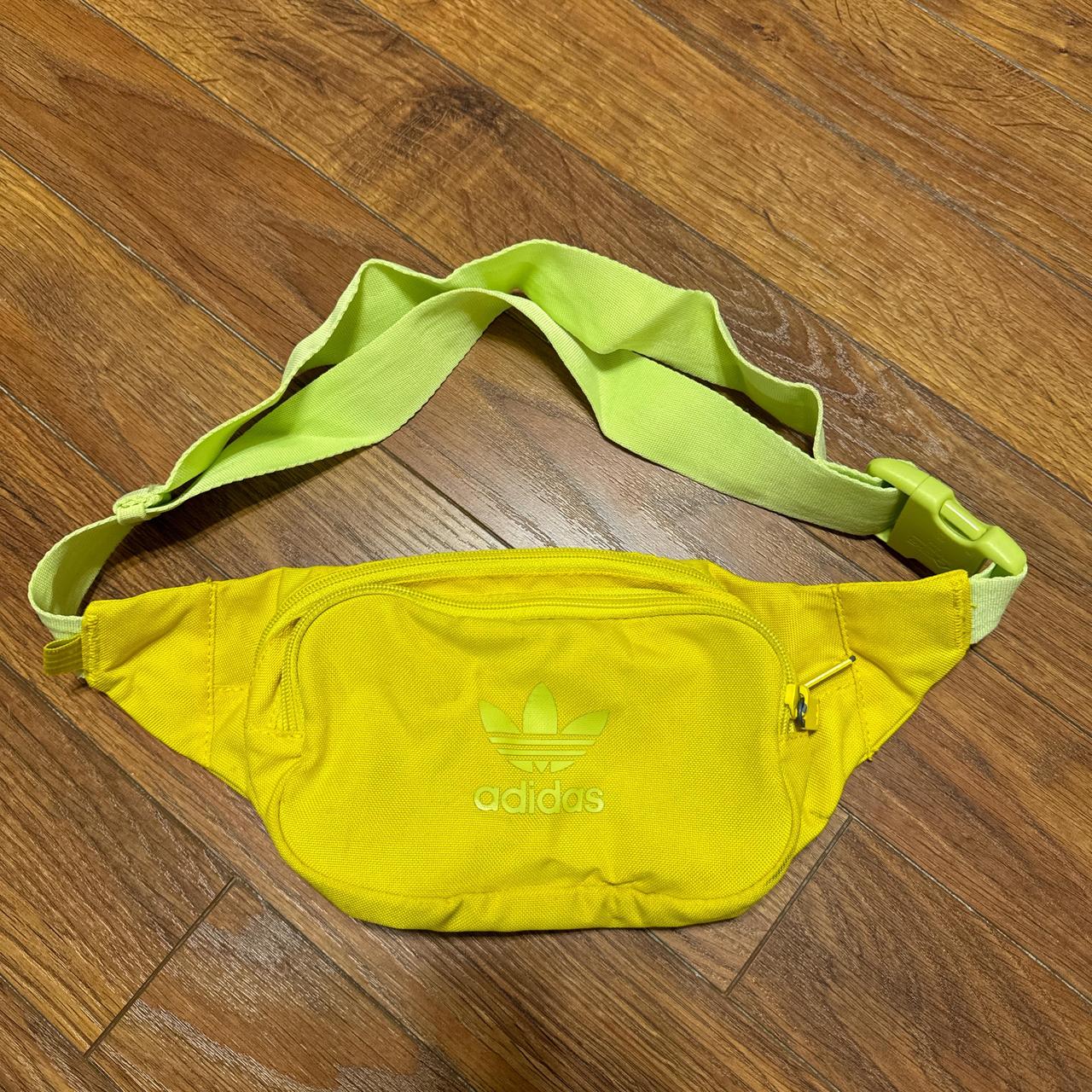 Yellow adidas Fanny pack crossbody bag with. Depop