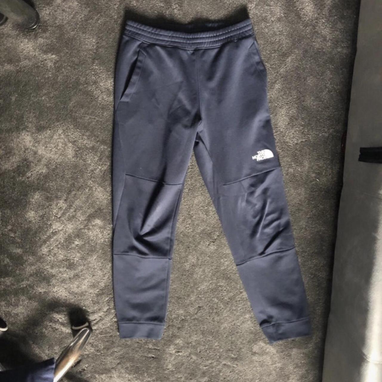 Blue North Face Joggers, great condition - Depop