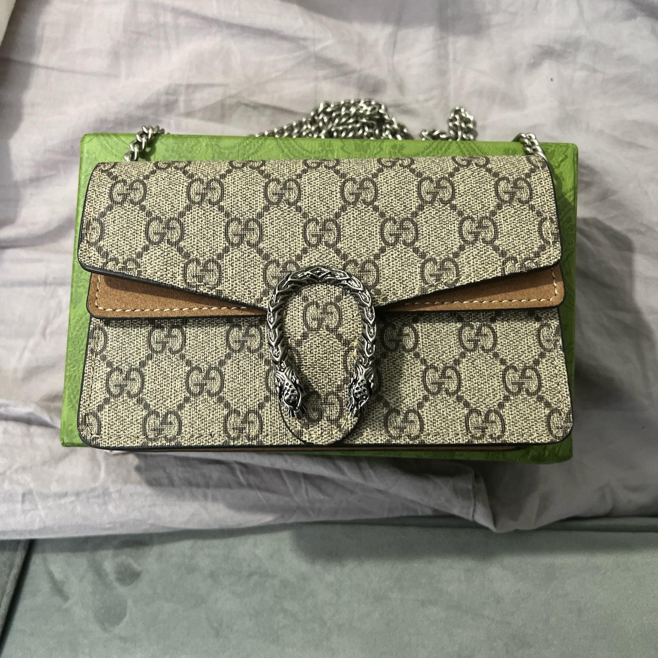 Gucci bag mini Perfect condition , has a few make up... - Depop