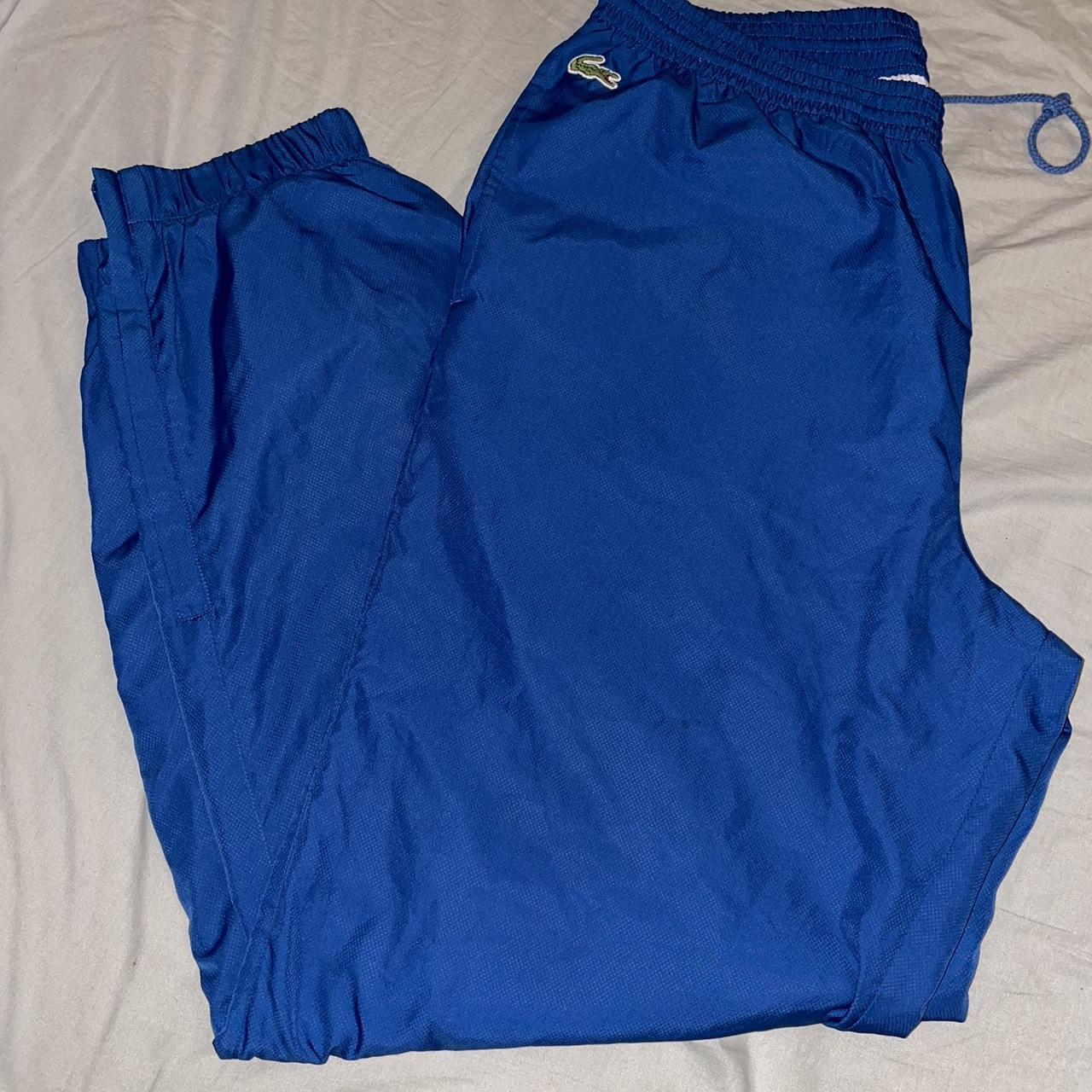 Lacoste tracksuit bottoms old badge in blue hard to... - Depop