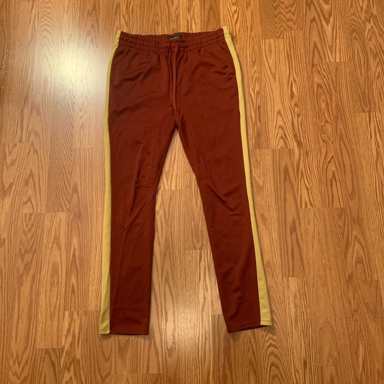 Vintage Pacsun track pants in red and yellow. In Depop