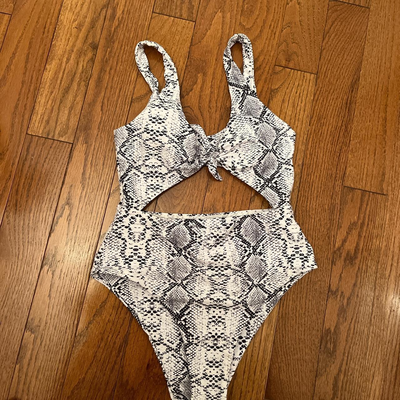 Cut out one piece bathing suit the tie in Depop