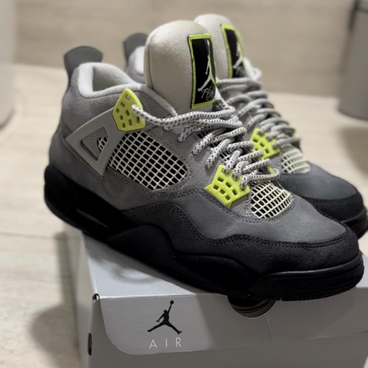 neon orange jordan 4