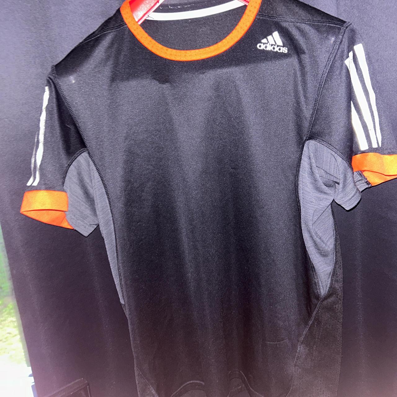 Black and orange adidas shirt hotsell