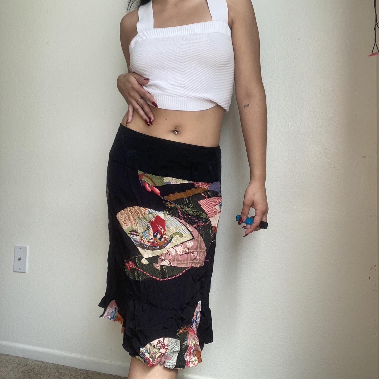 GlobeTrotter Women's Black Skirt Depop