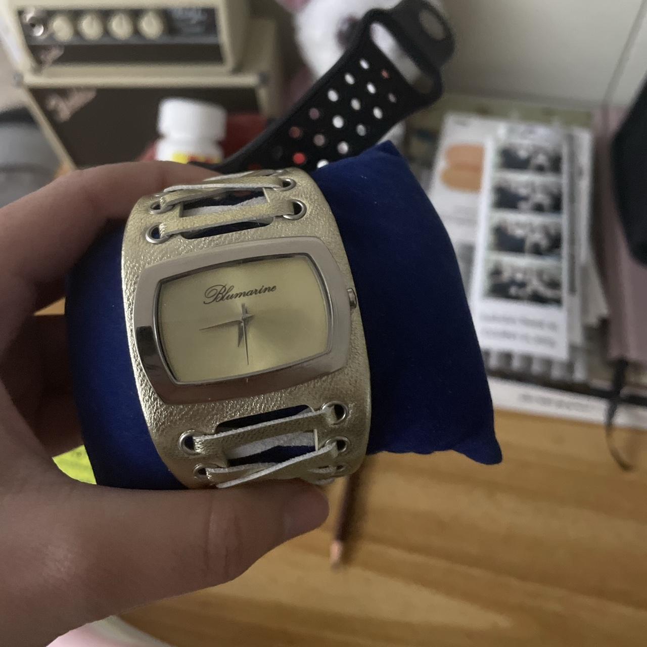 Blumarine metallic corset watch. WILL NEED REPAIR.... Depop