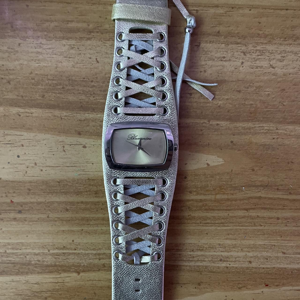 Blumarine metallic corset watch. WILL NEED REPAIR.... Depop