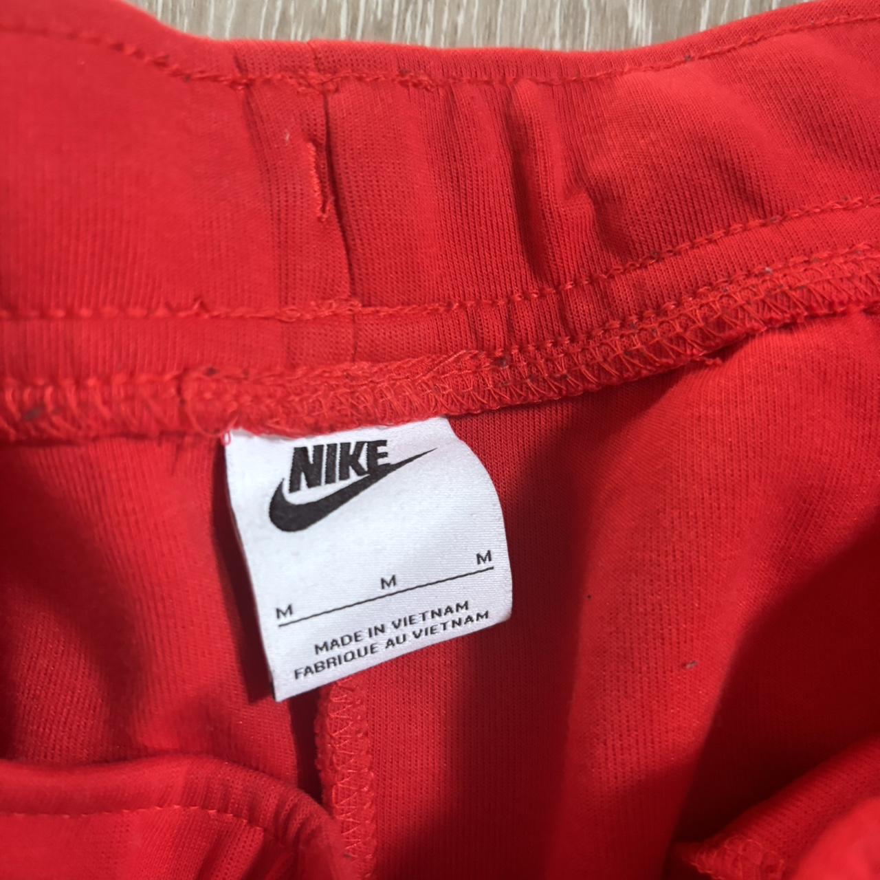 mens red nike tech