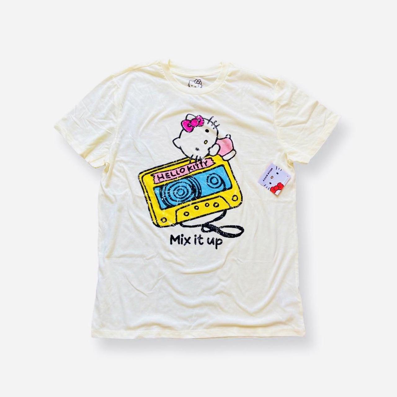 white Hello Kitty design t-shirt with four tiny - Depop