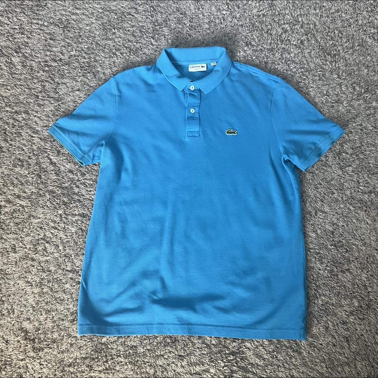 Blue Lacoste Polo Shirt... - Depop