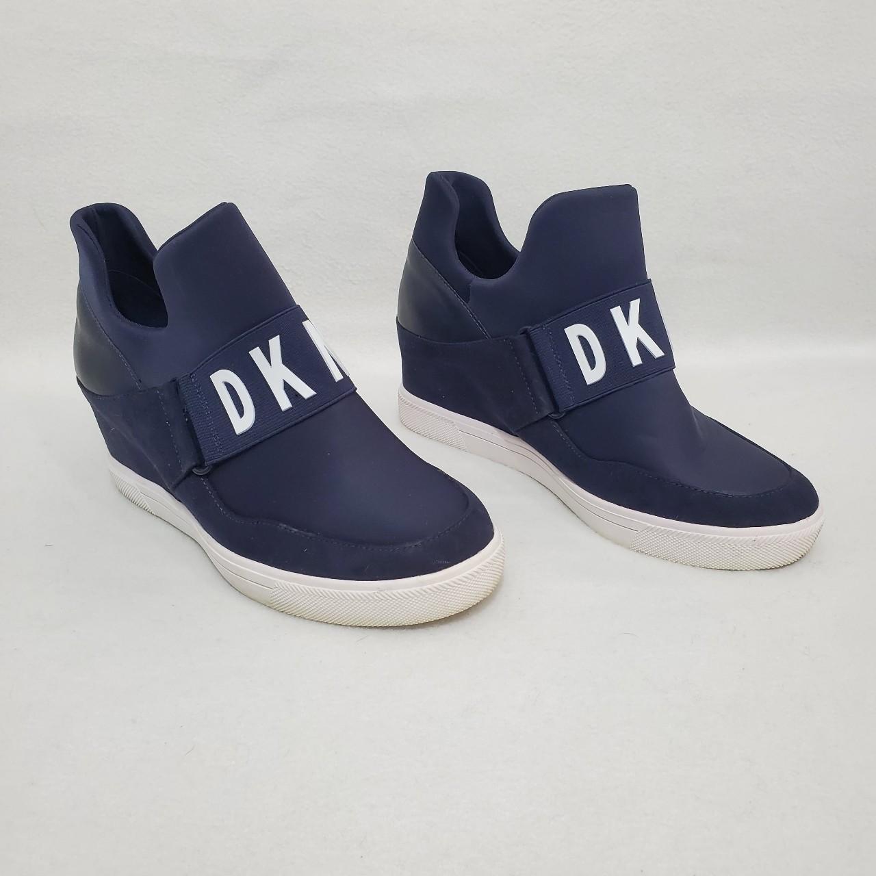 Pre owned DKNY Cosmos sneakers size 8.5M. They come