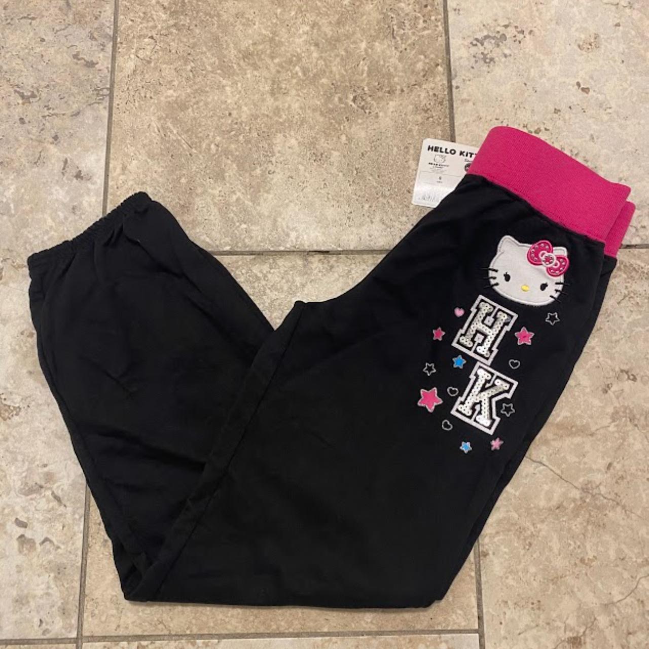 hello kitty girl's jogger pants; black; rolled cuff;... - Depop
