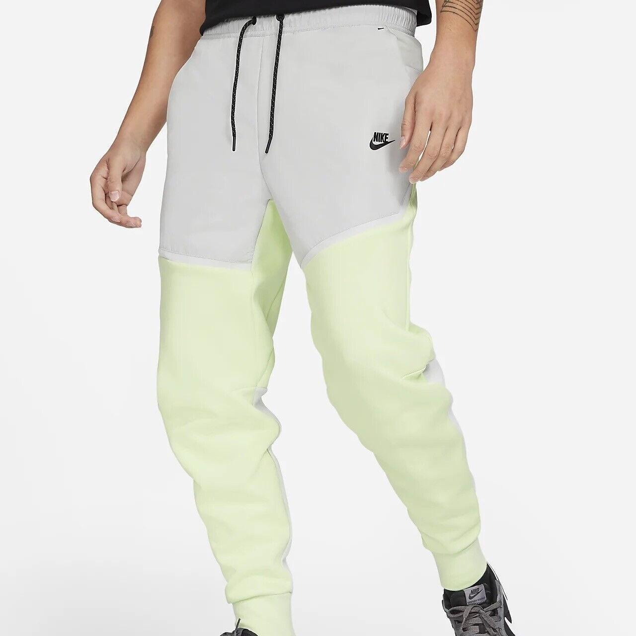 Lime green nike joggers sale