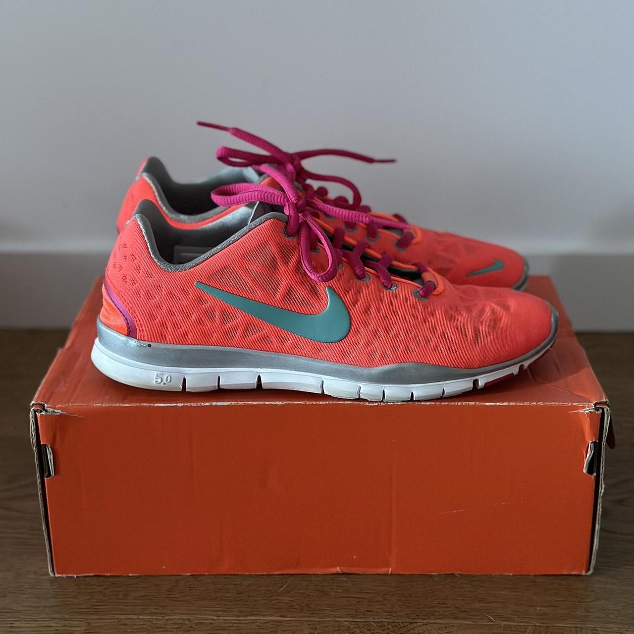 Woman s Nike Free. Neon Orange with pink laces and. Depop