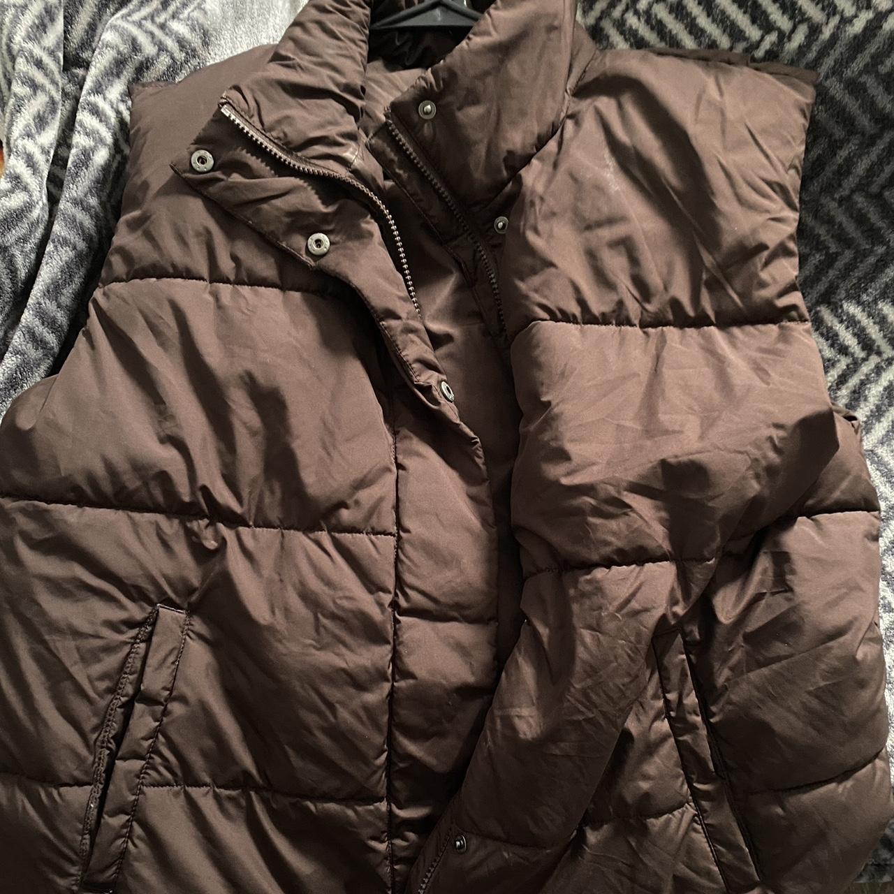 sleeveless brown puffer jacket - Depop