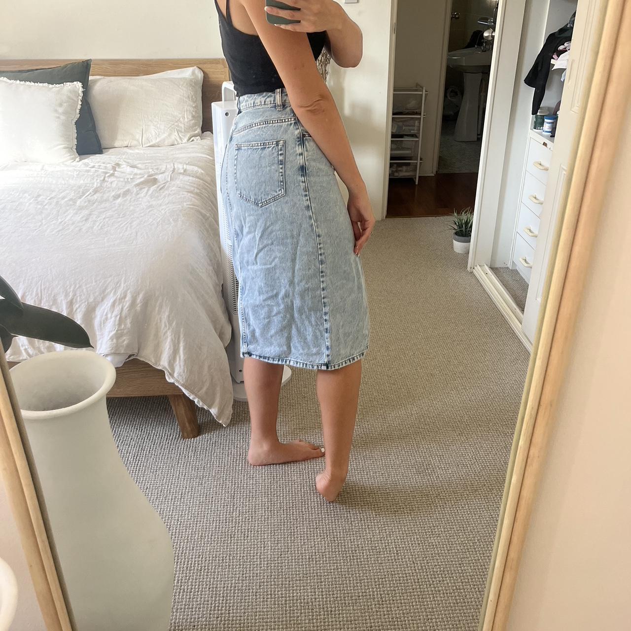 Decjuba denim midi skirt with front slit. Size 8... Depop