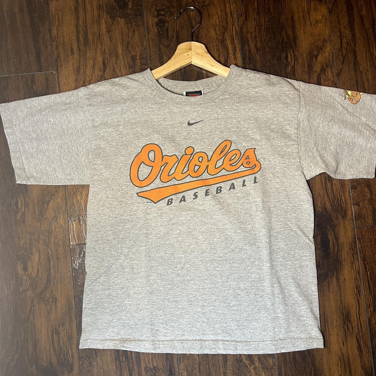 Orange Nike Dri-Fit Orioles t-shirt. The size is an - Depop