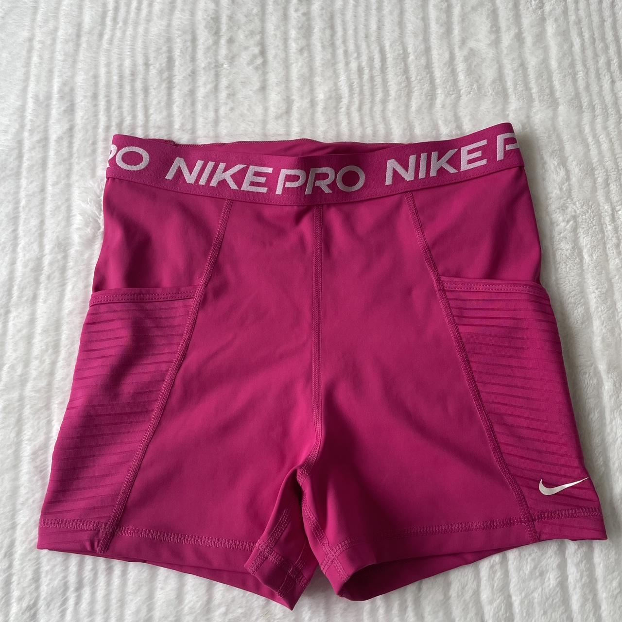 pink nike pros (size M) has 2 side pockets and... - Depop