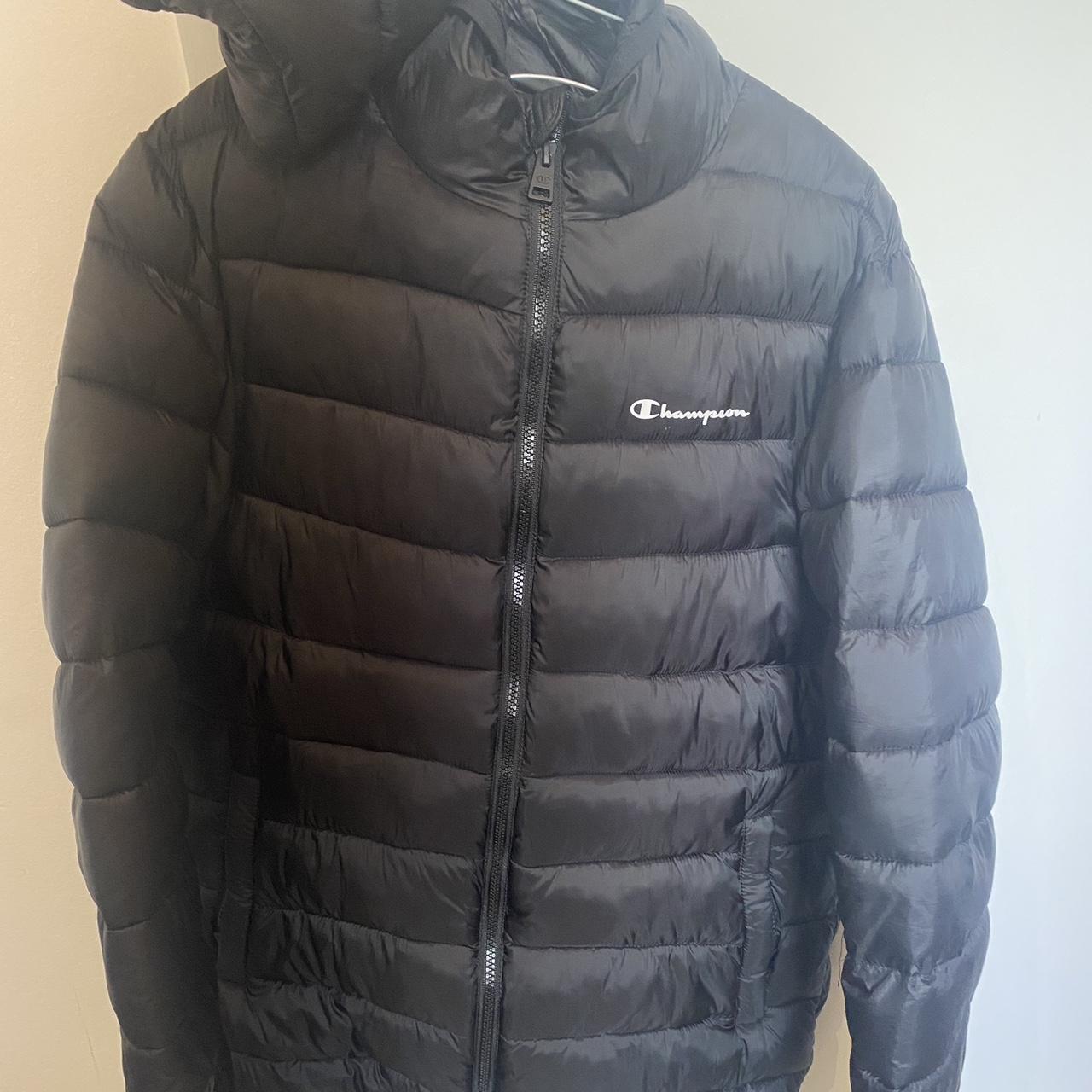 Black champion puffer jumper with hood RPP... - Depop