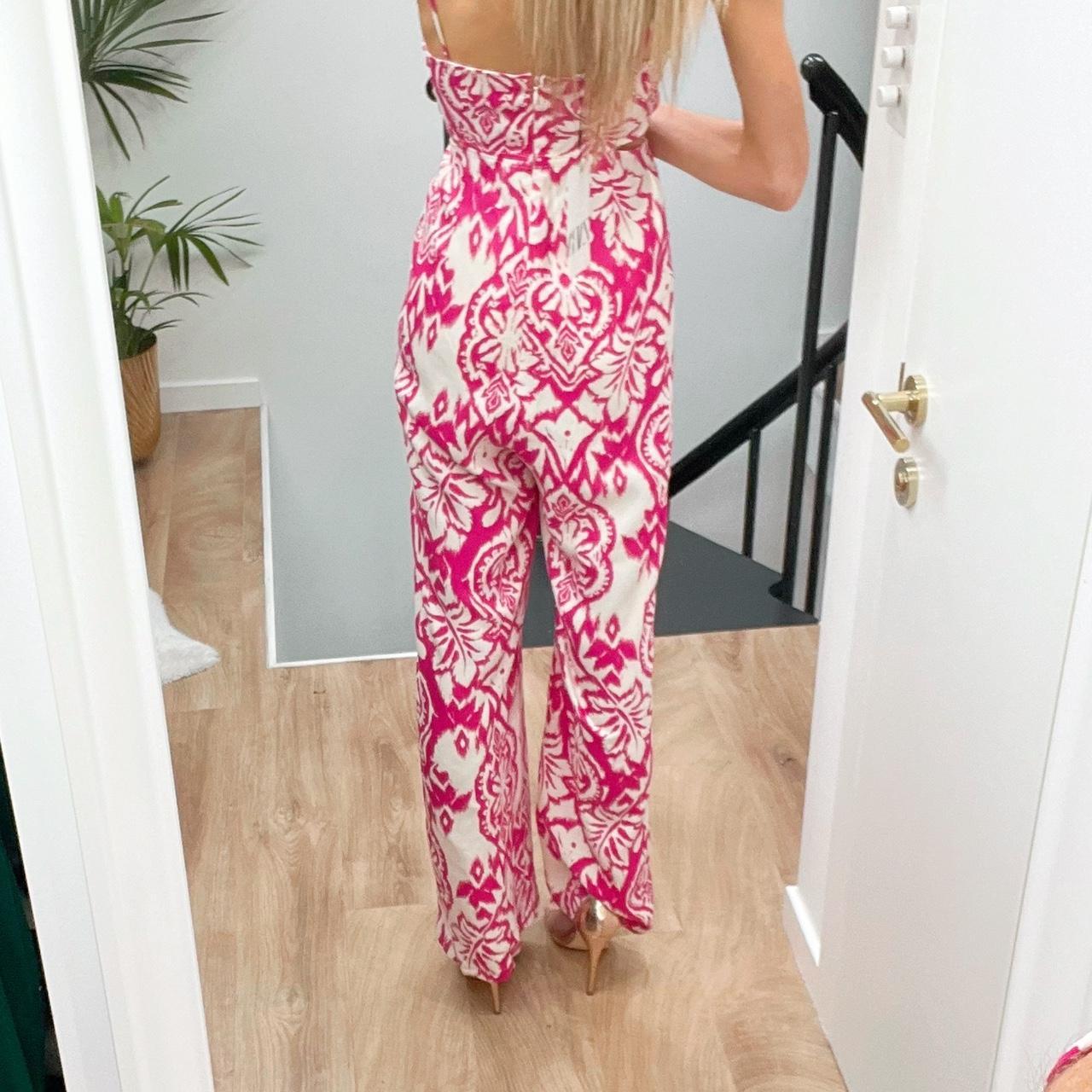 Pink white jumpsuit online