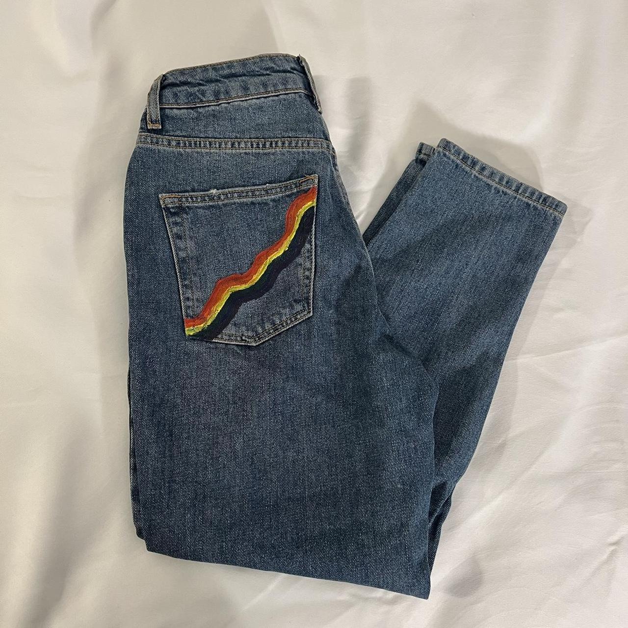 blue petite ripped mom jeans with painted rainbow on