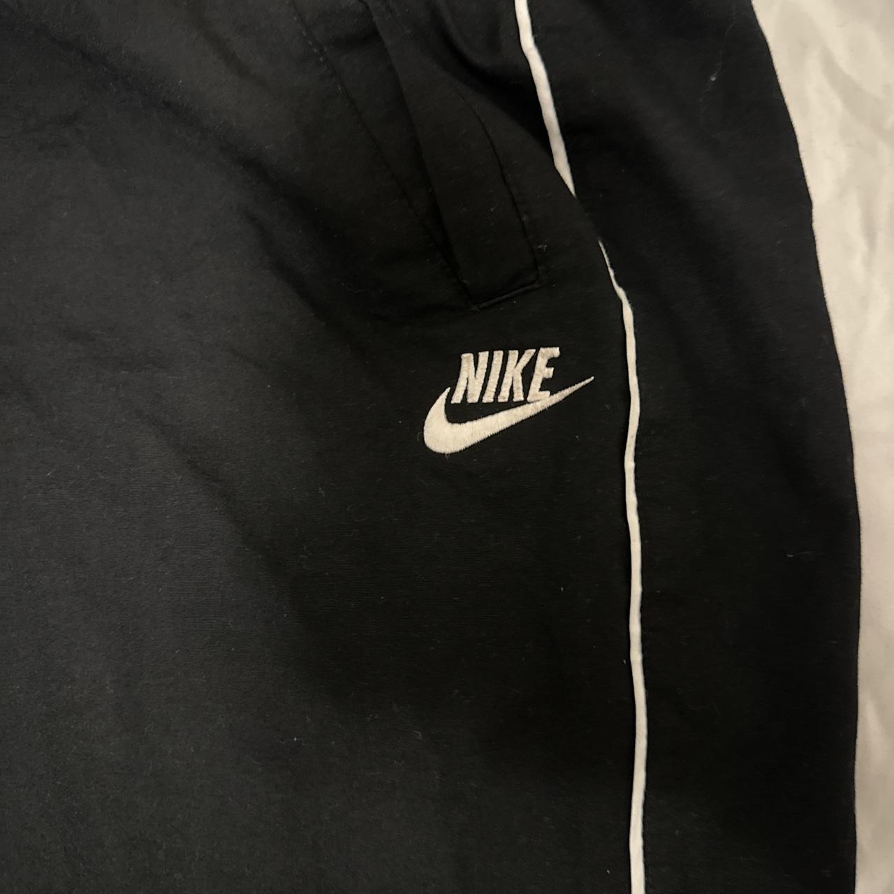 thrifted nike trackpants •labeled as a XL but fits... - Depop