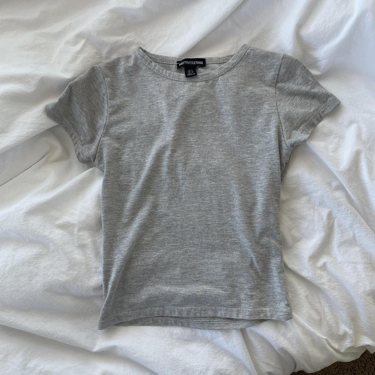 pretty little thing grey baby tee size xs, decent... Depop
