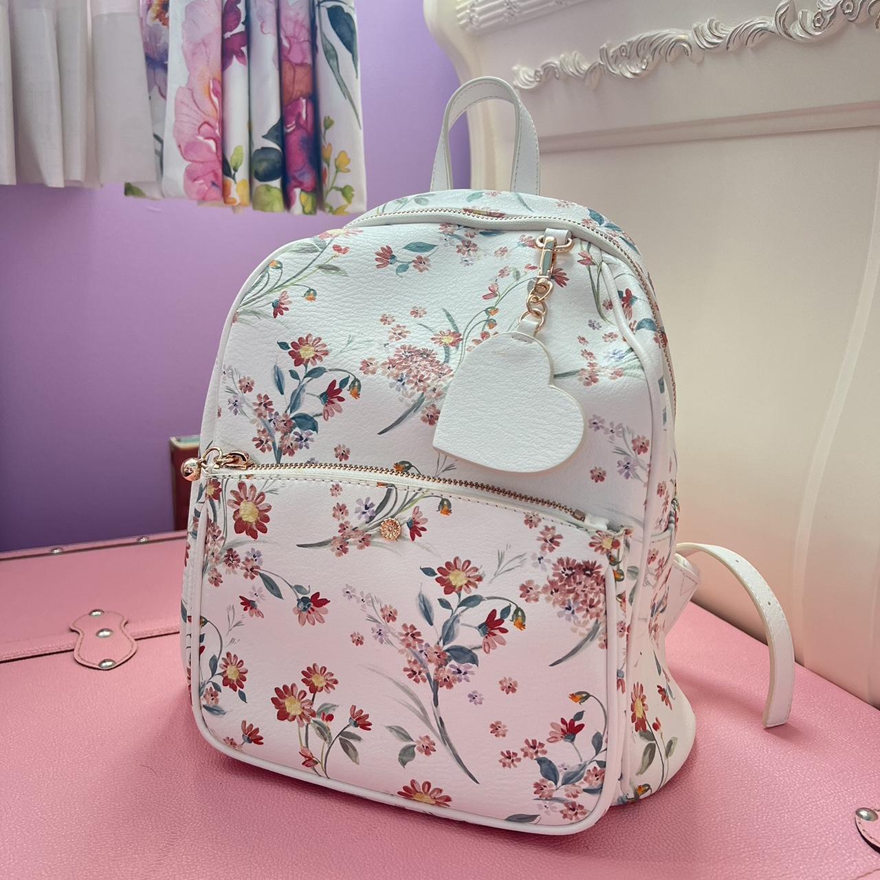 floral lauren conrad mini backpack w/ heart charm - Depop