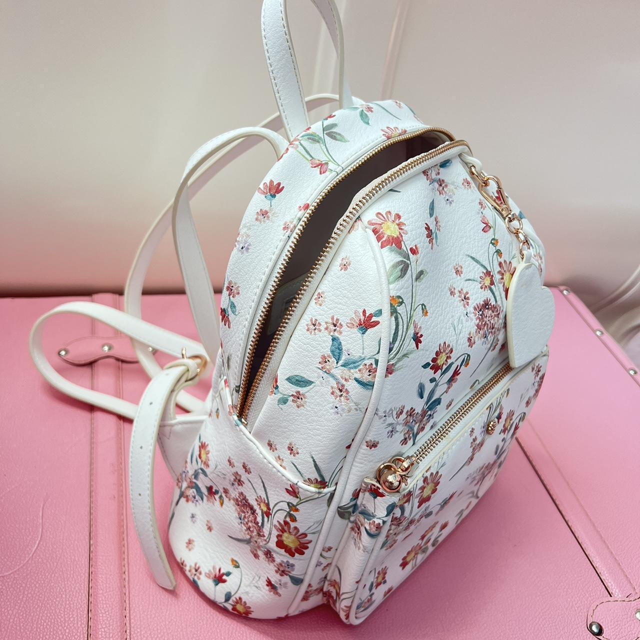 floral lauren conrad mini backpack w/ heart charm - Depop