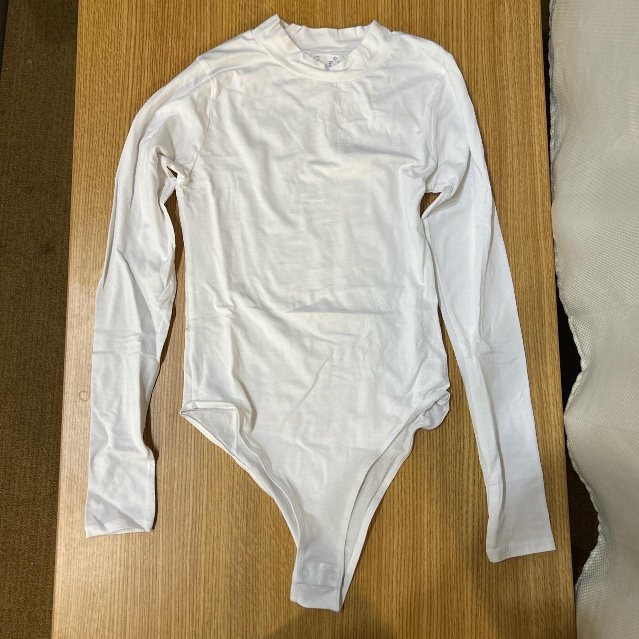 White mock neck long sleeve bodysuit from Primark... Depop