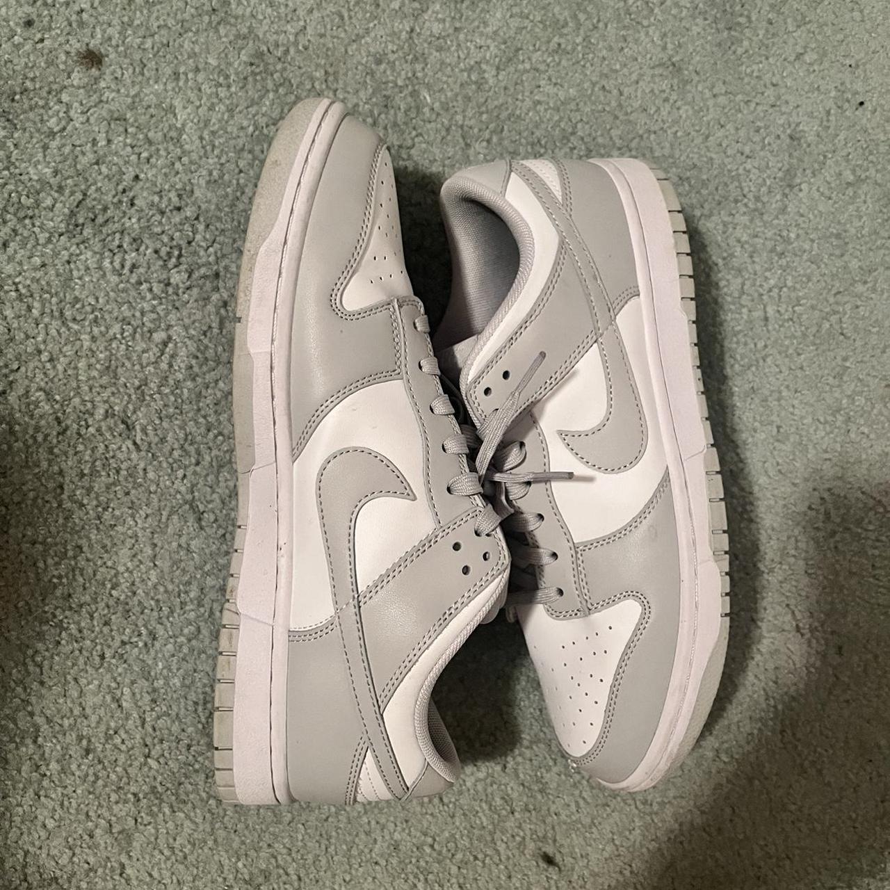 gray and white nike air