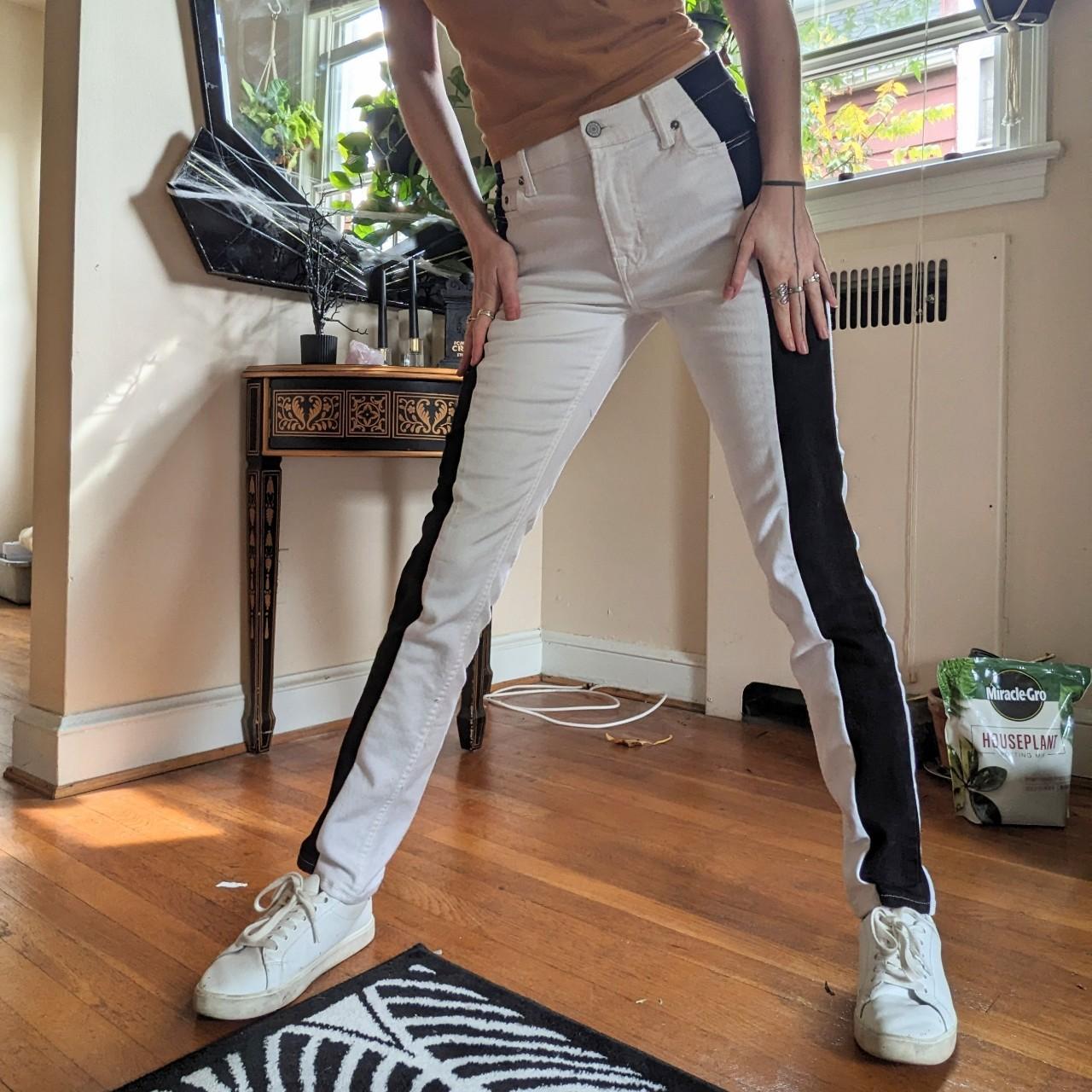 White jeans with store black side stripe