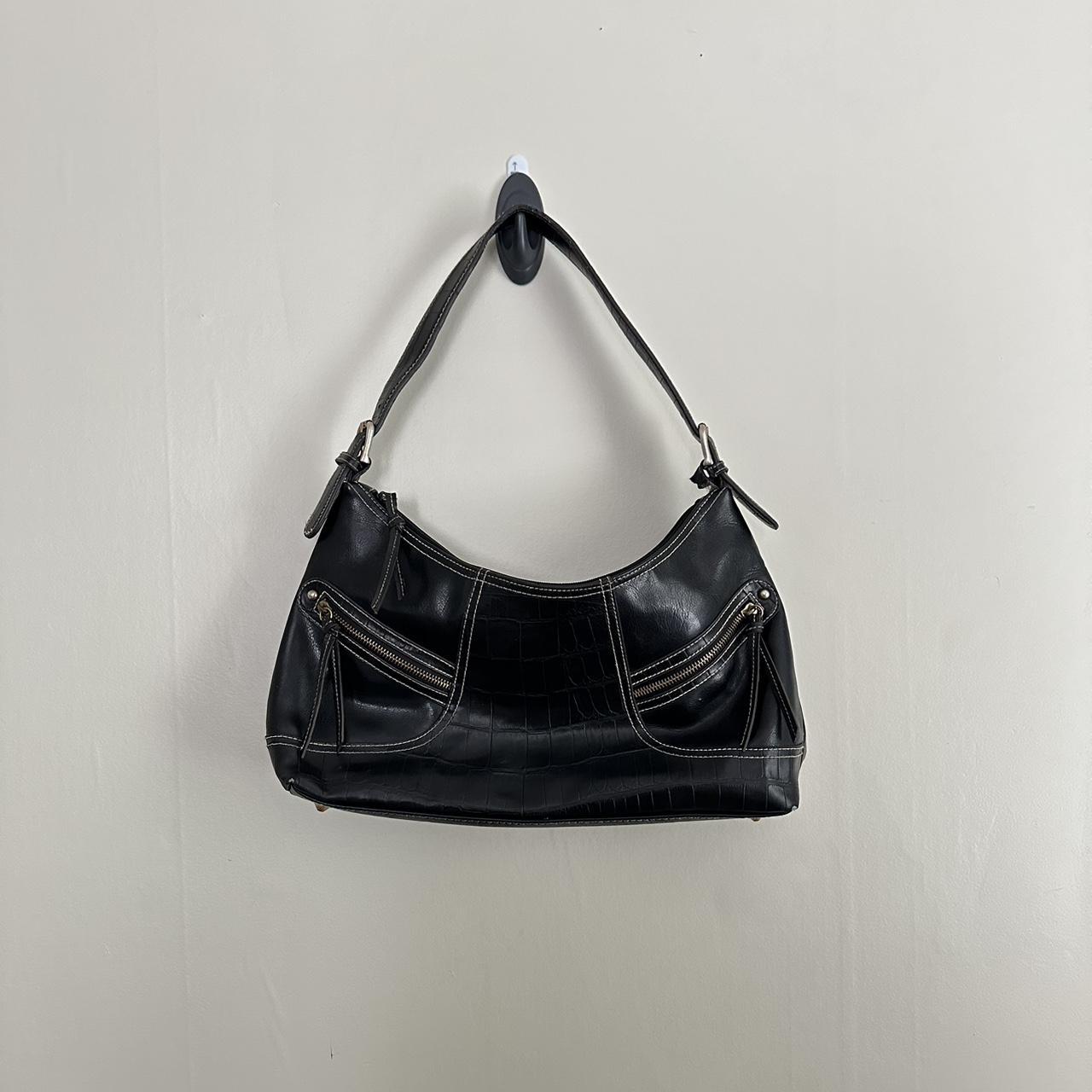 Black leather shoulder bag with zipper closure and