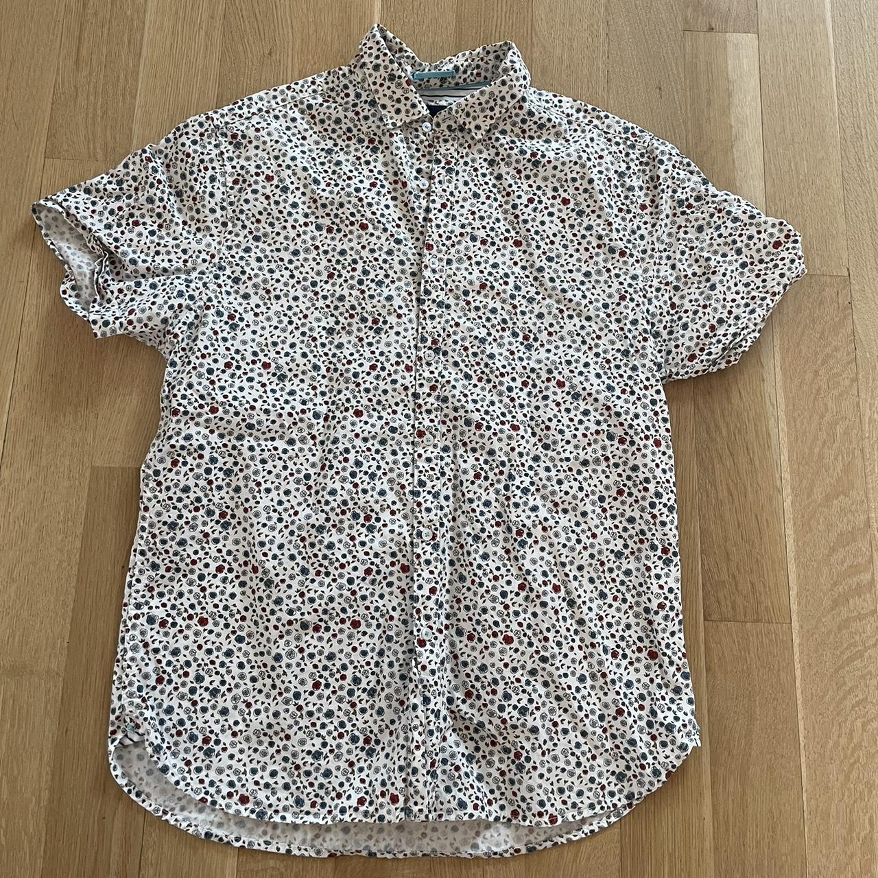 Men’s denim and flower shirt in a size large. It’s... - Depop