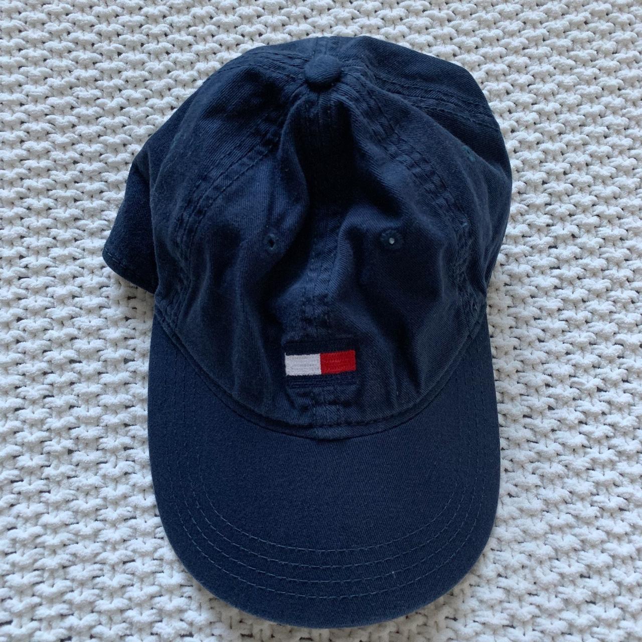 red tommy hat