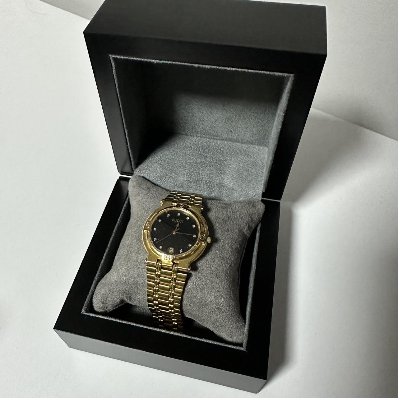 Gucci gold watch hot sale black face