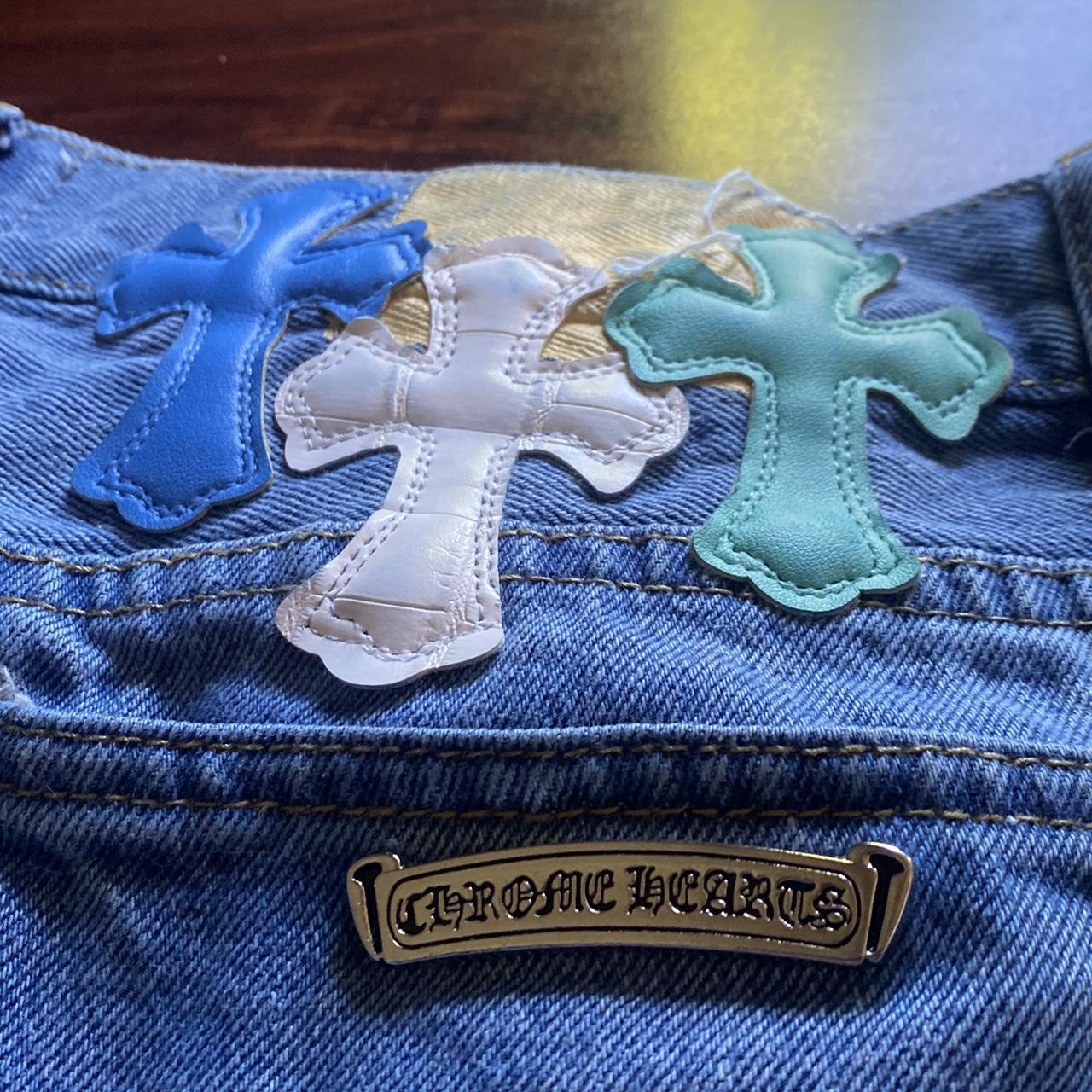 CHROME HEARTS LIGHT BLUE DENIM JEANS IN BLACK LEATHER CROSS PATCH